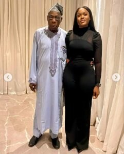 Former president Olusegun Obasanjo Holding Cee C waist 